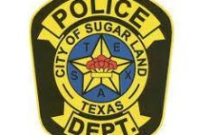 Woman robbed at gunpoint in Sugar Land