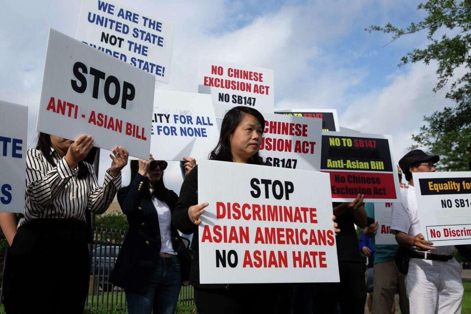 Protesters gather at Sen. Kolkhorst’s Katy office in opposition to bill banning Chinese from buying land