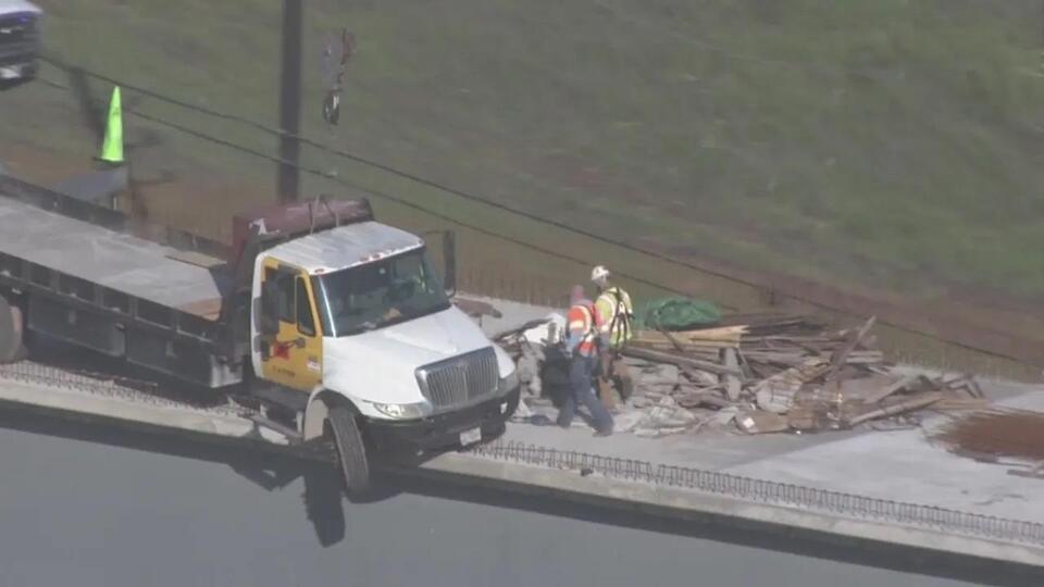 Truck hangs off Fort Bend County flyover near FM 1093, SH 99